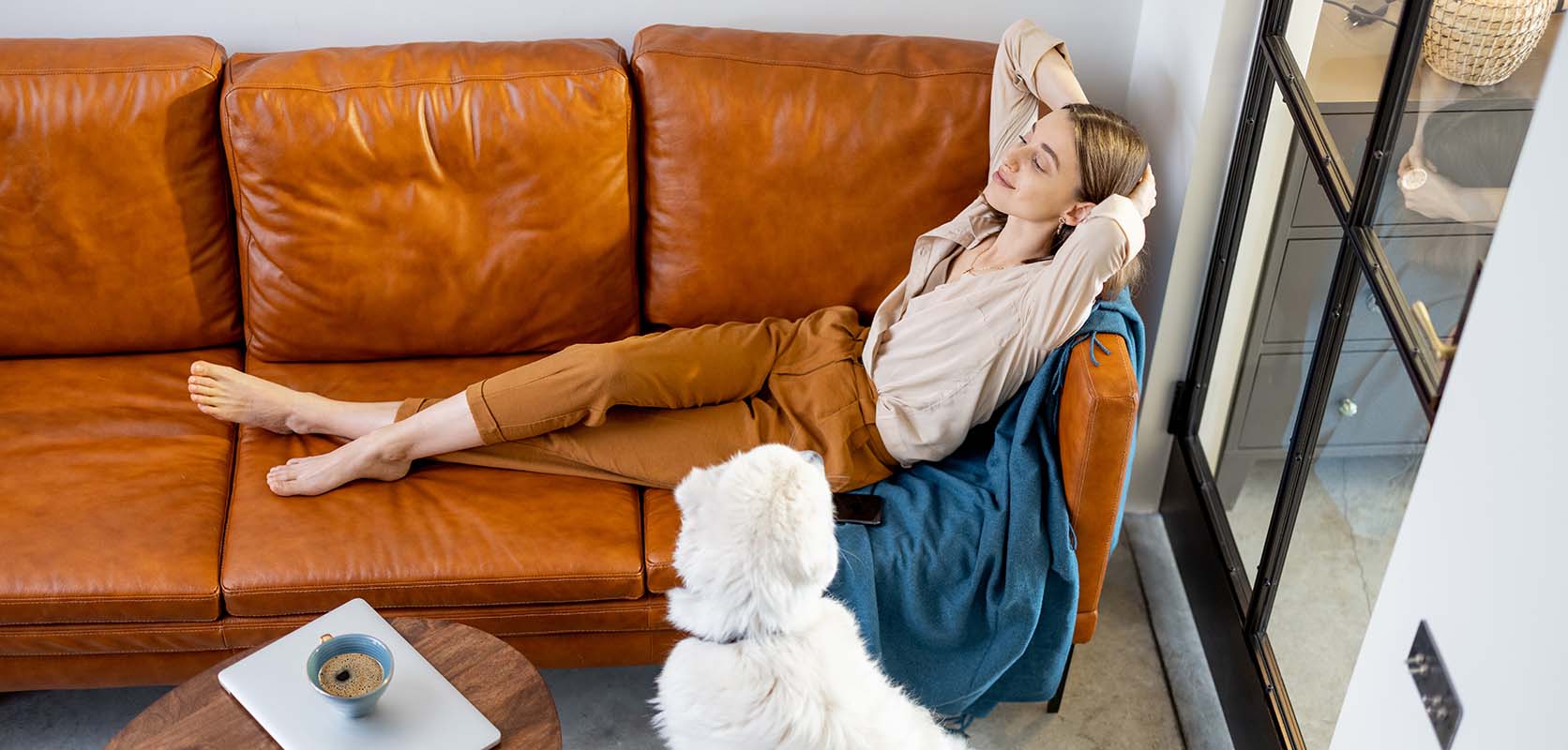 woman relaxing on sofa after ordering weed online in canada from west coast cannabis online dispensary