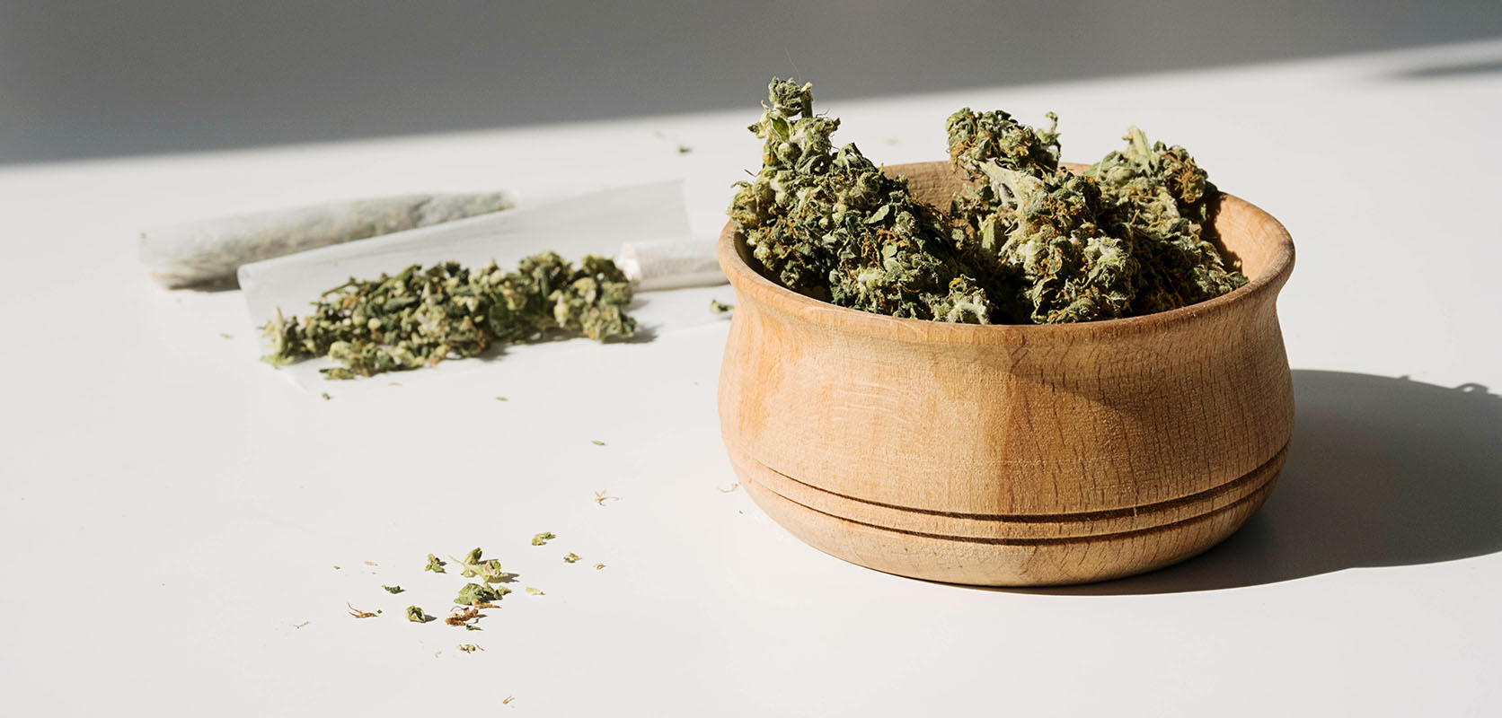 image of weed in a grinder that was bought online in canada. buy weed online and order weed from west coast cannabis online dispensary.