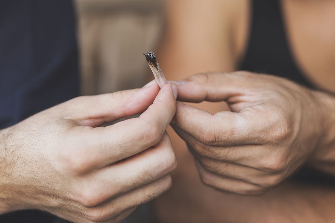 people passing a joint and enjoying a weed smoking session. buy weed online canada. mail order marijuana. mail order weed canada.