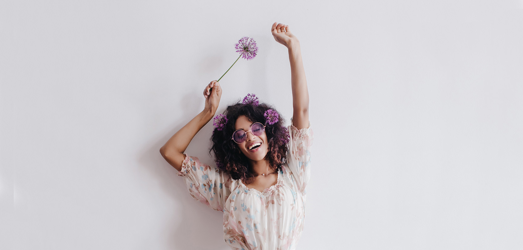 Happy woman with flowers in her hair. buy cannabis concentrates online. concentrates canada. dab drug. 