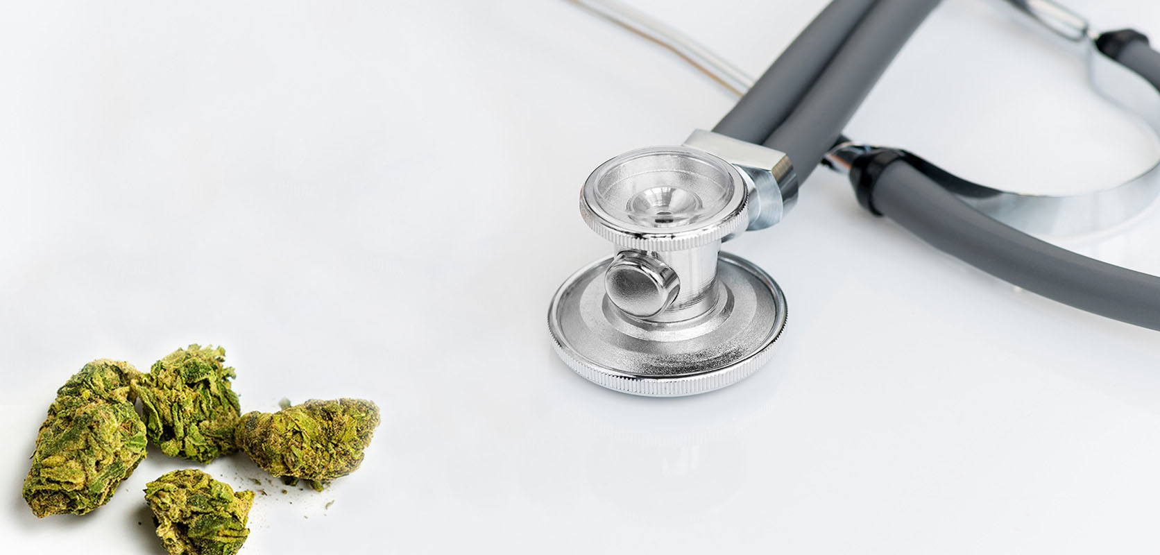 Stethoscope and buds of weed. online dispensary. buy online weeds. thc e juice.